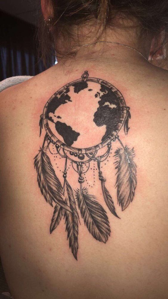 Dream catcher combined with world map tattoo.