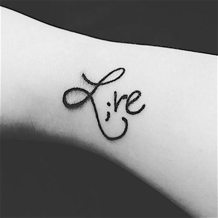 Elegant and meaningful semicolon tattoo.