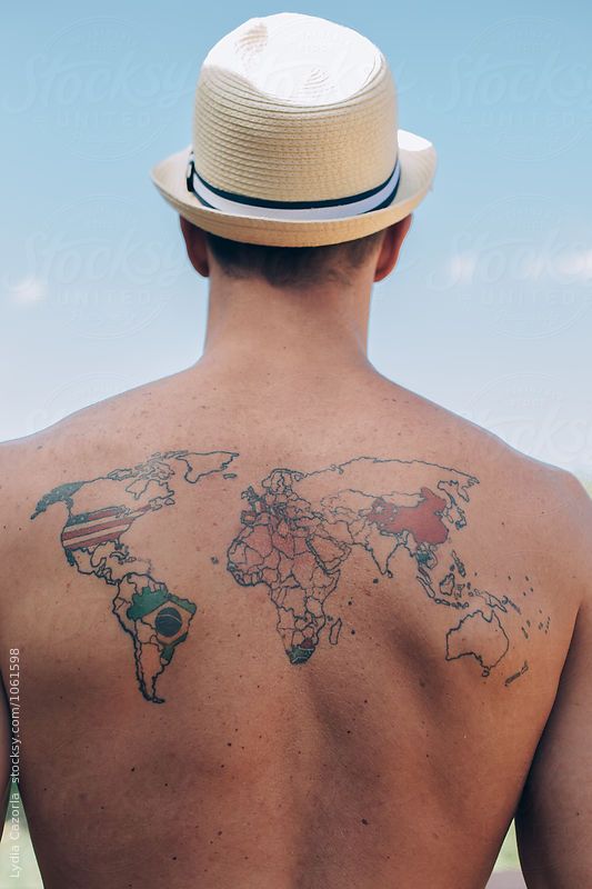 Fabulous world map tattoo on back.