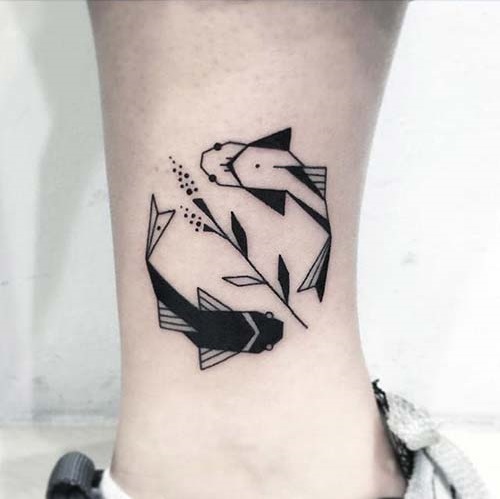 Geometric tattoo of fishes.
