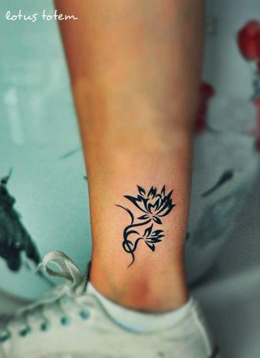 Glamorous idea to ink lotus flower tattoo on ankle.