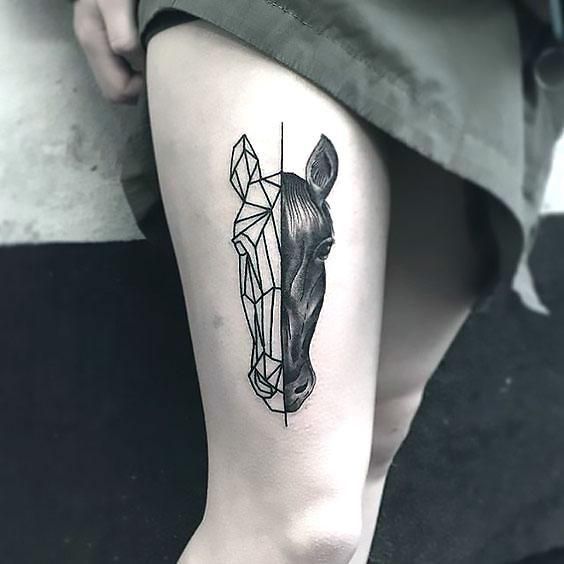 Half realistic and geometric horse face tattoo on thigh.