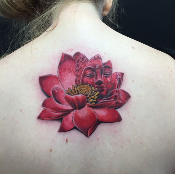 Hidden Buddha lotus flower tattoo with great meaning.
