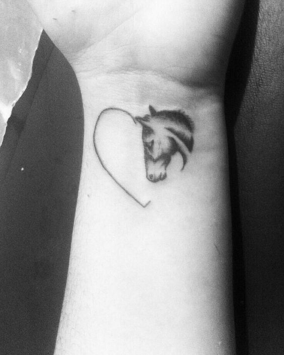 Horse face with heart on wrist.