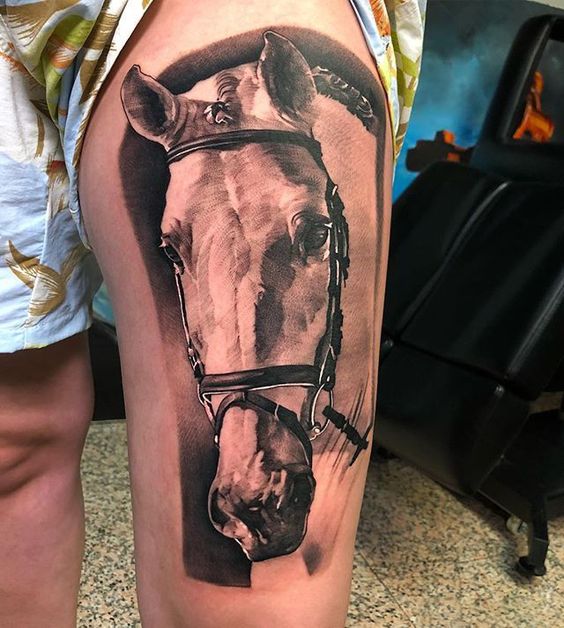 Horse tattoo on thigh opt for who love racing.
