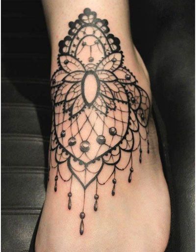 Lacey foot tattoo.