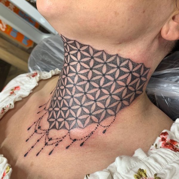 Love this lace neck tattoo.
