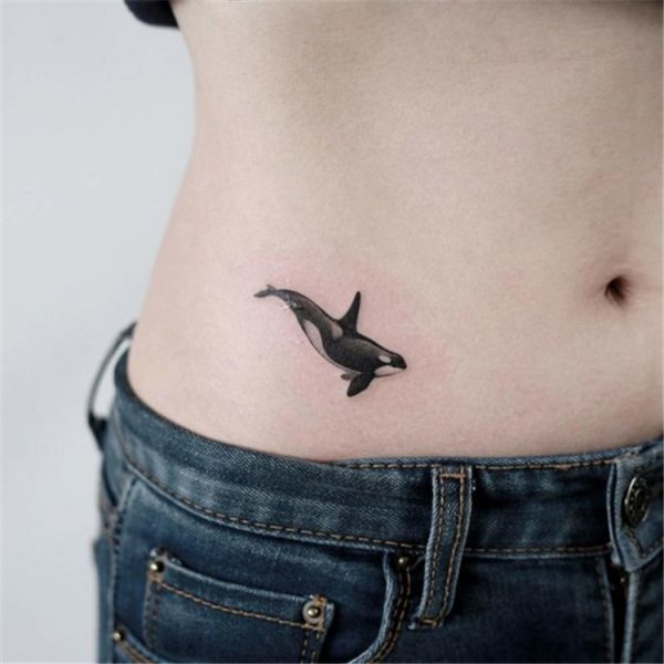 Lovely small fish tattoo idea.