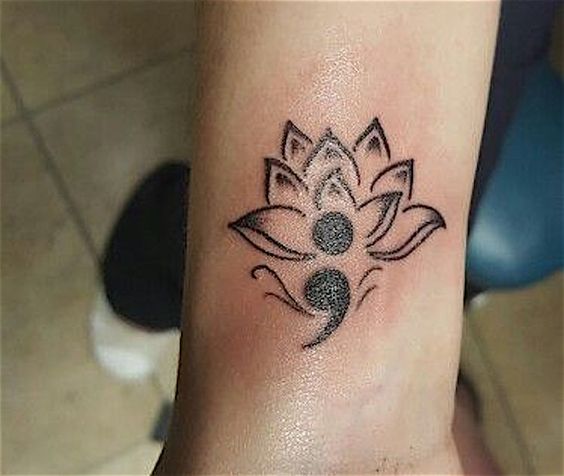 Mandala semicolon wrist tattoo.