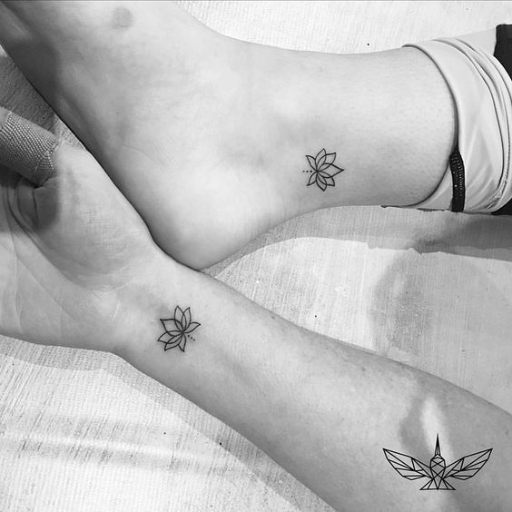 Matching lotus tattoo for friends.