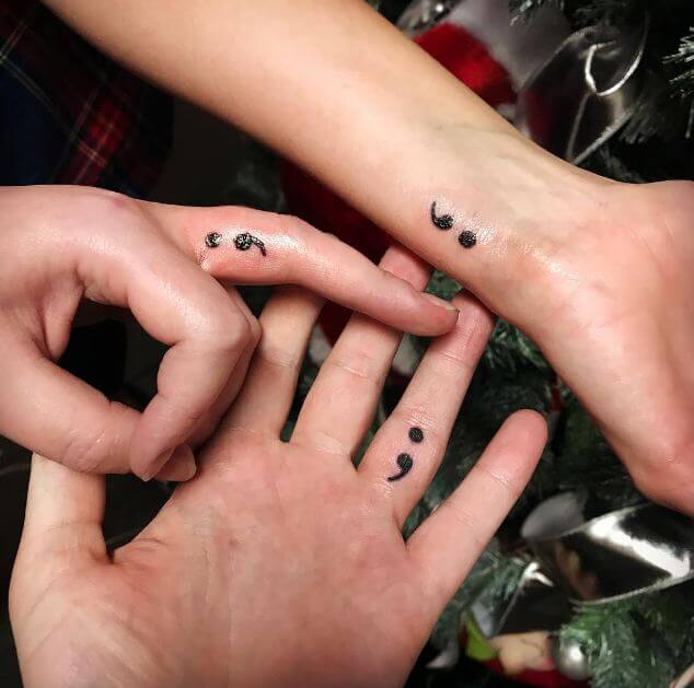Matching semicolon tattoo for siblings.
