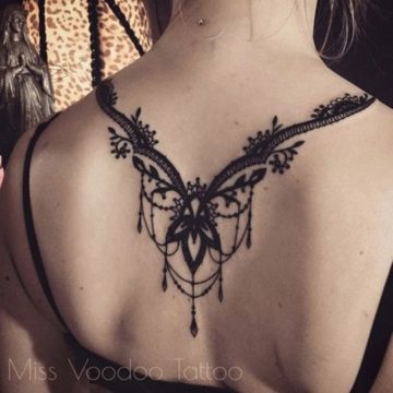 Nice lace neck tattoo design.