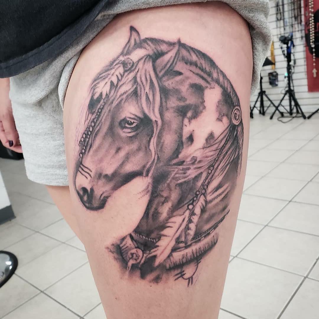 Realistic horse tattoo design for thigh.