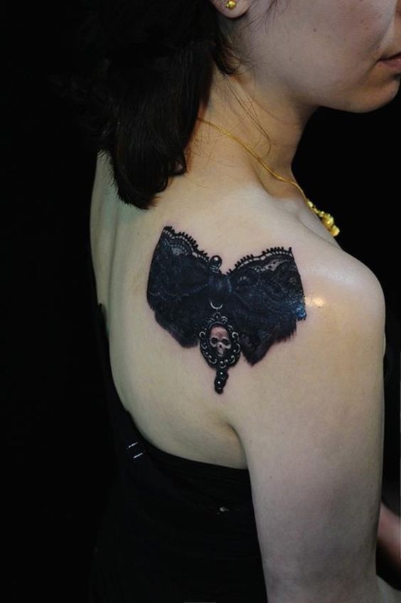 Remarkable black shoulder lace tattoo for women.