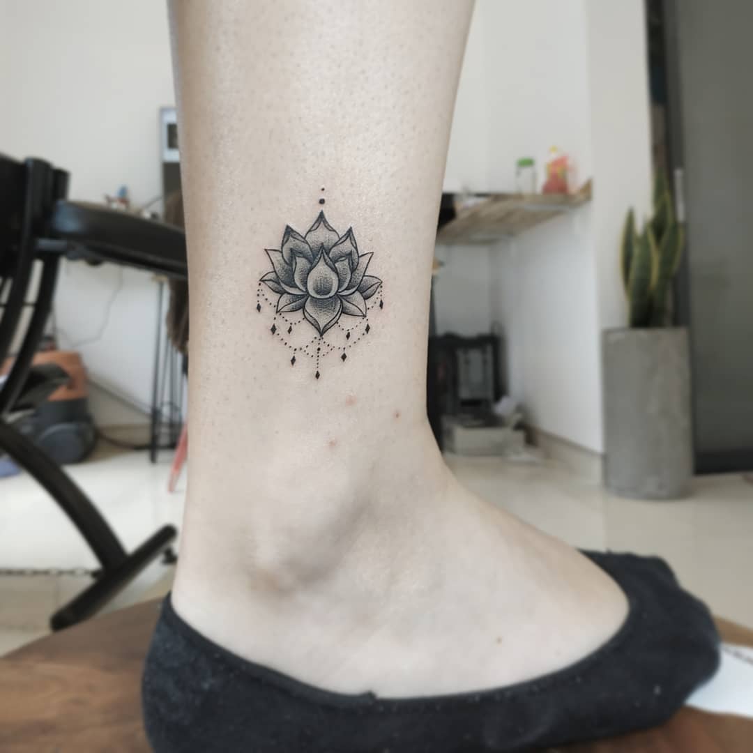 Small lotus lace tattoo design.