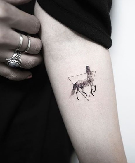 Small running horse tattoo perfect for inner forearm.