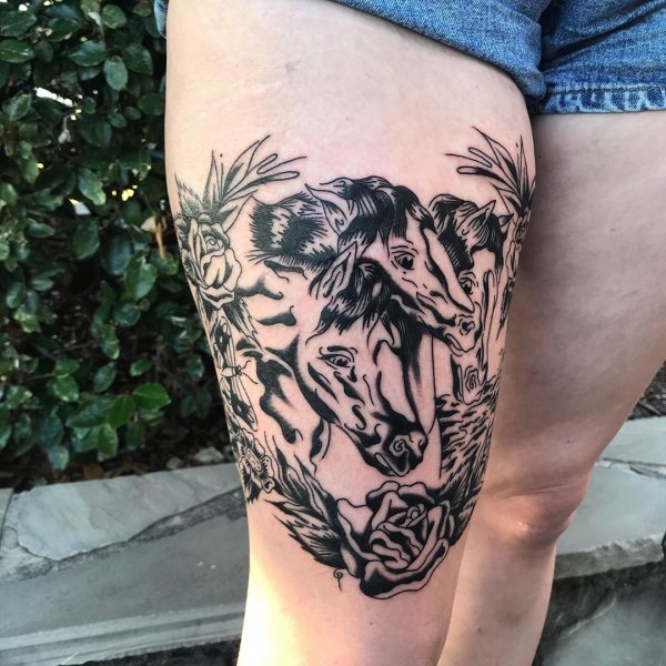 Thigh provides large space and therefore you can try multiple horses tattoo on your thigh.