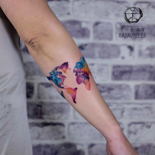 Watercolor world map tattoo for forearm.