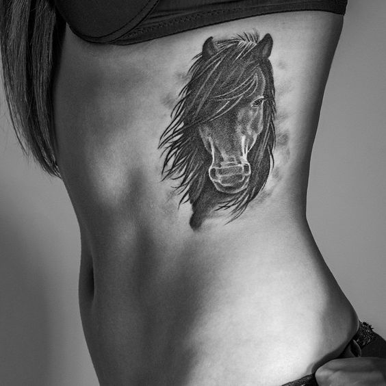 You can opt a dark horse tattoo design to show that other people should never underestimate your guts.