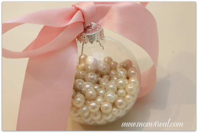 Beautiful pearls in a glass ball.
