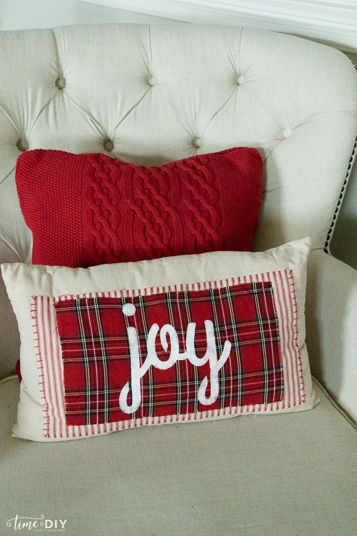 Beautiful plaid no sew Christmas pillow with joy sign.