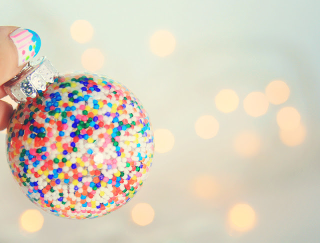 Colors candy sprinkles glass ball ornament.