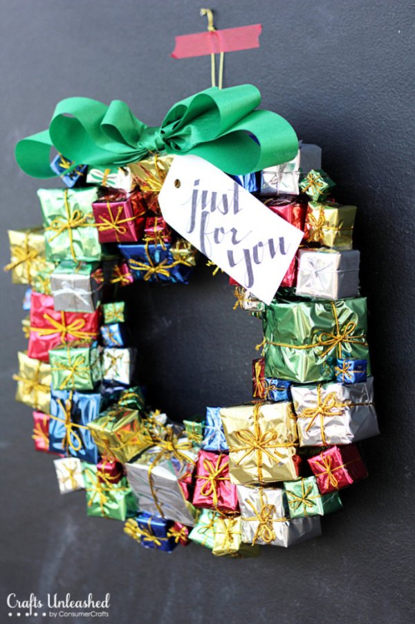 DIY gift box wreath for door decor.