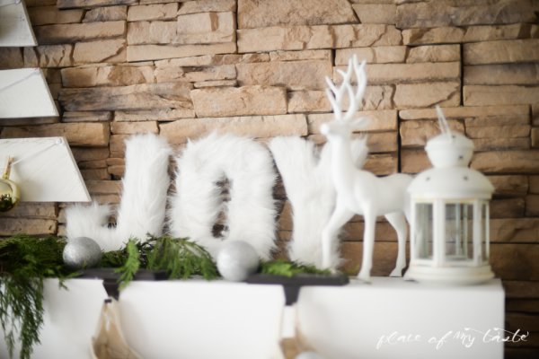 Furry mantel decor with fur letters.