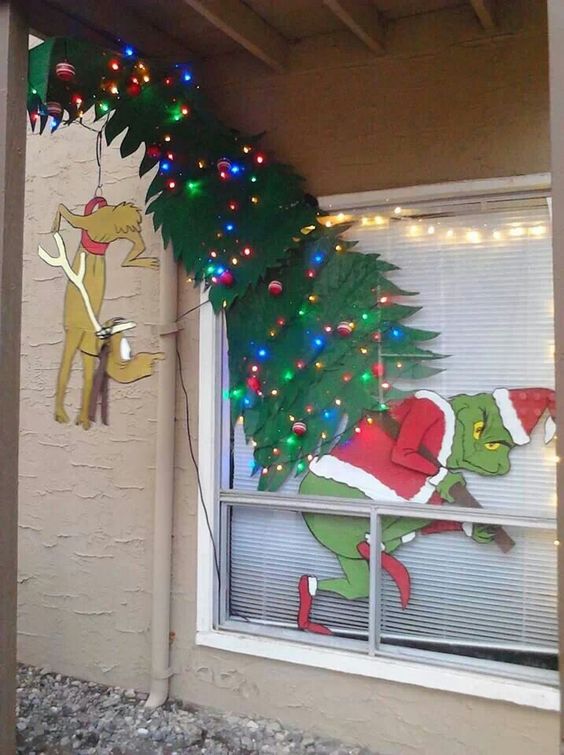 Incredible Grinch theme Christmas window decoration.