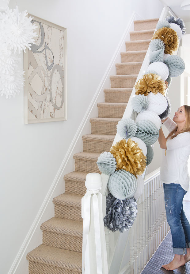 Paper cutout garland for staircase decoration.