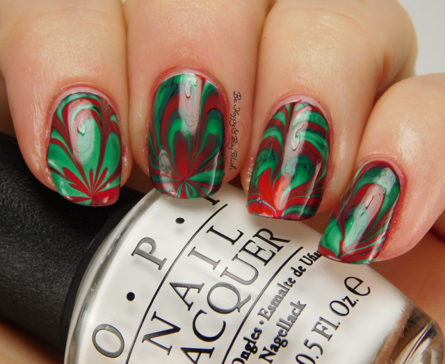 Perfect green & red water marble nails.