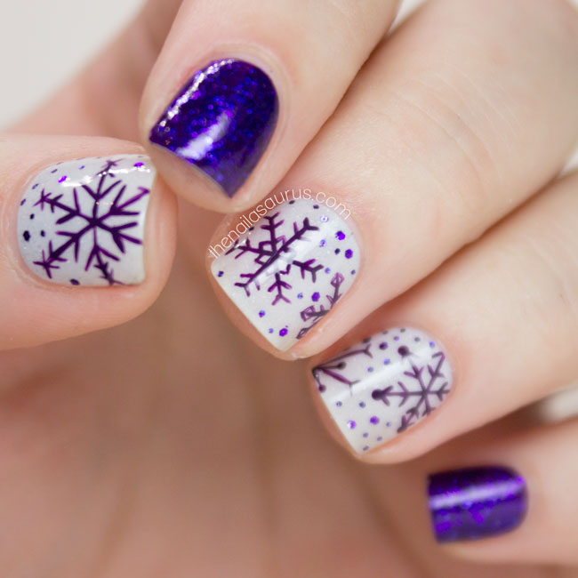 Pretty snowflake nails.