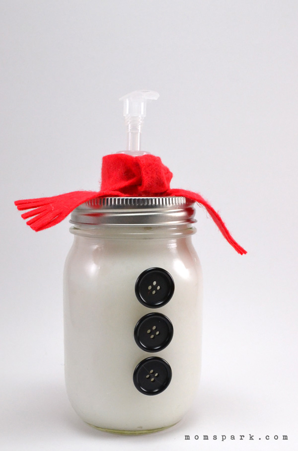 Pretty snowman mason jar lotion.