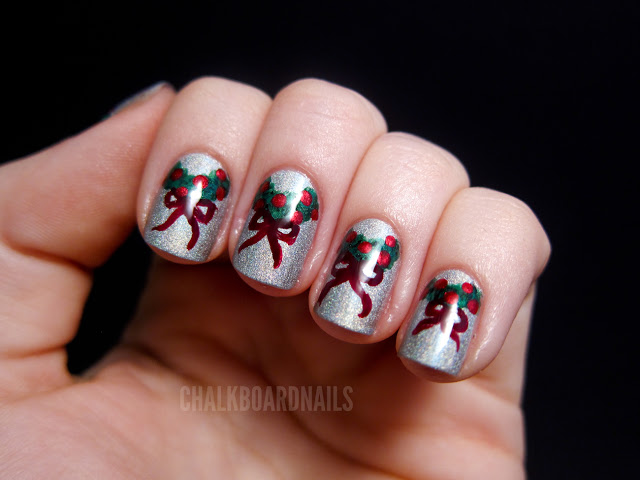 Red holly and scarlet bows nails for Christmas.