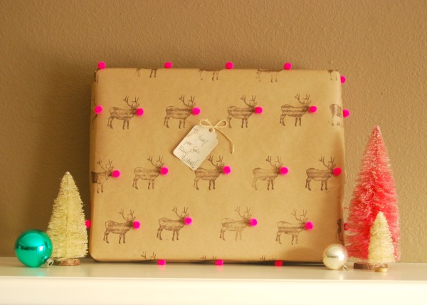 Reindeer pom pom gift wrap for Christmas.
