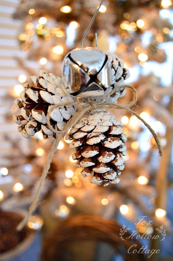 Rustic jingle bell pinecone ornaments for Christmas tree.
