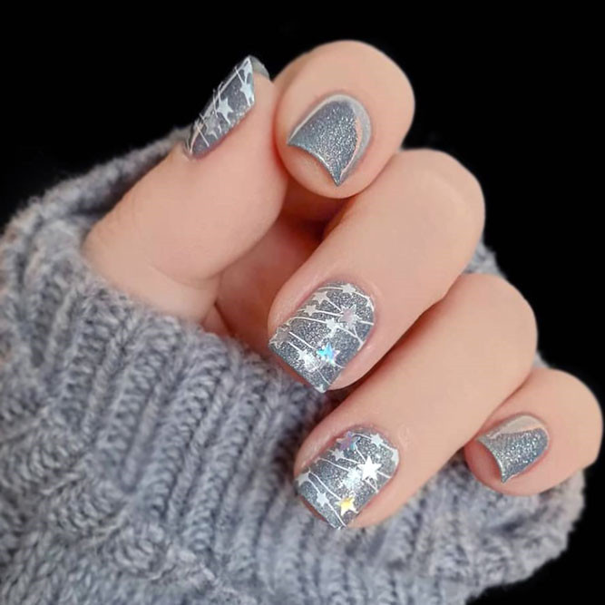 Silver festive nails.