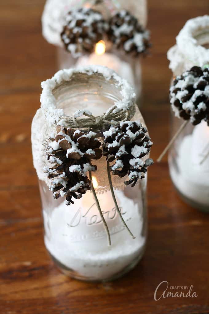 Snowy pinecone candle jars.