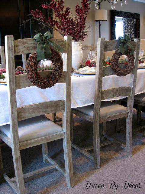 Star anise wreaths on backs of dining room chairs.