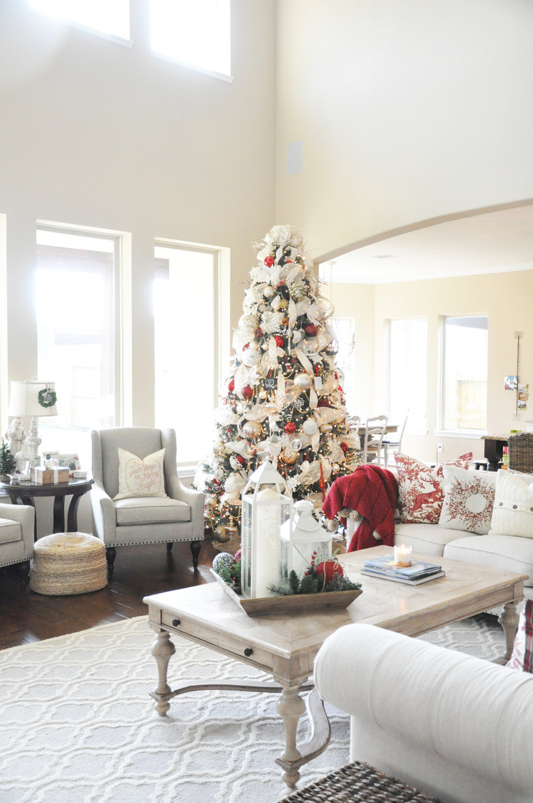 Adorable living room decoration with beautiful Christmas tree.