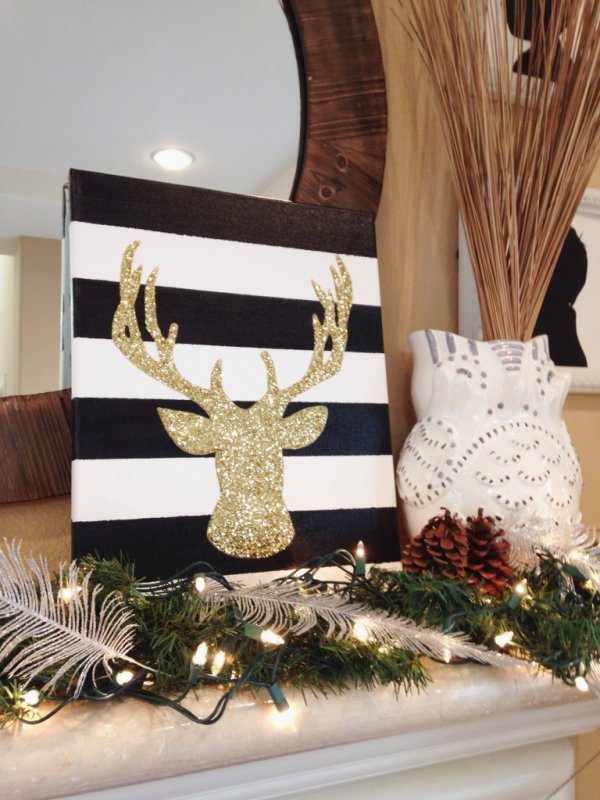 DIY gold and glittery deer head canvas for your mantel.