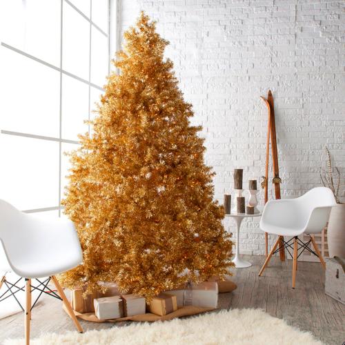 Exclusive idea to place golden Christmas tree in living room.