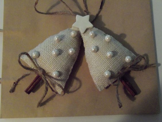 Fabulous burlap cinnamon stick Christmas tree ornaments decorated with pearls.