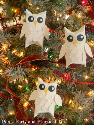 Glamorous snow owl ornaments.