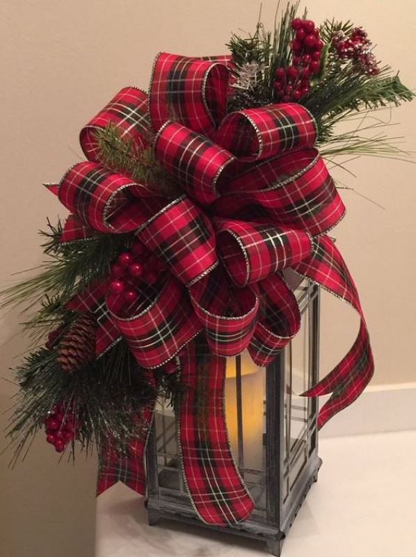 Old lamp is decorated with plaid swag for Christmas.