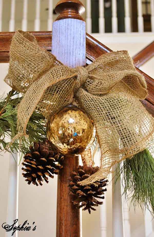 Sassy idea to decorate gold bulb with pinecones and burlap.