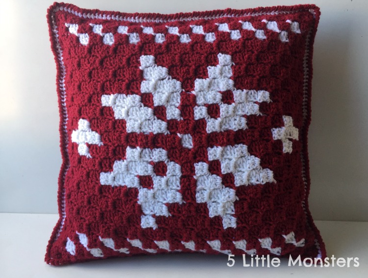 Scandinavian crochet snowflake pillow.