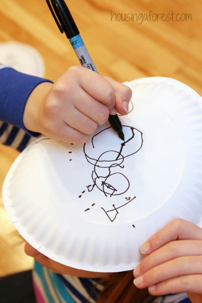 Simple paper plate snowman drawing contest.