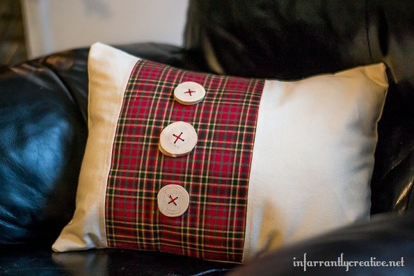Tartan plaid pillow woth wood slice buttons.