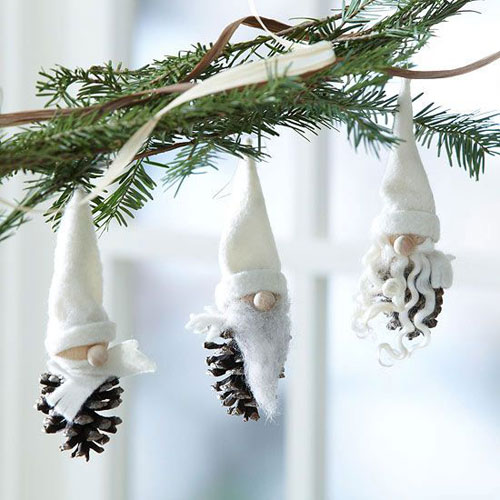 Trio of pinecone gnome ornaments.
